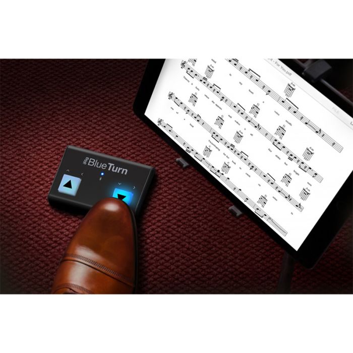 iRig BlueTurn with the notes on the pad connected to page turn wireless bluetooth controller.